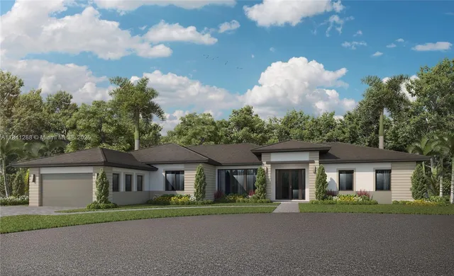 a front view of a house with a garden and trees