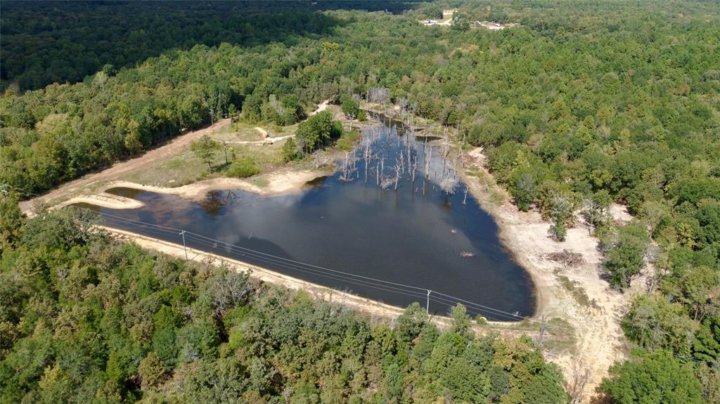 154 St Quitman Tx 75783 Quitman, TX 75783 - Photo 22 of 35 an aerial view of a house with a yard