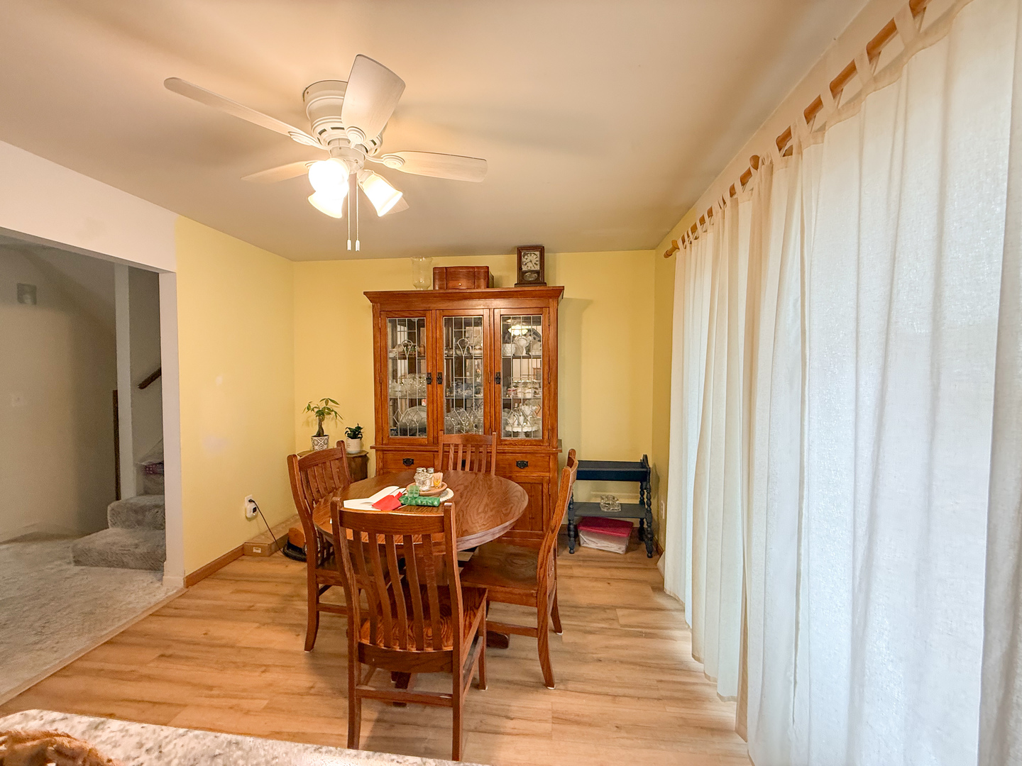 802 East 19th Street Sterling, IL 61081 - Photo 12 of 29 a dining room with furniture and window