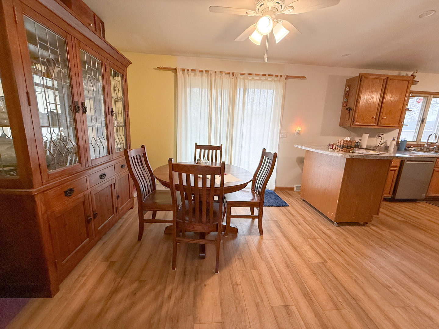802 East 19th Street Sterling, IL 61081 - Photo 13 of 29 a view of a dining room with furniture window and wooden floor