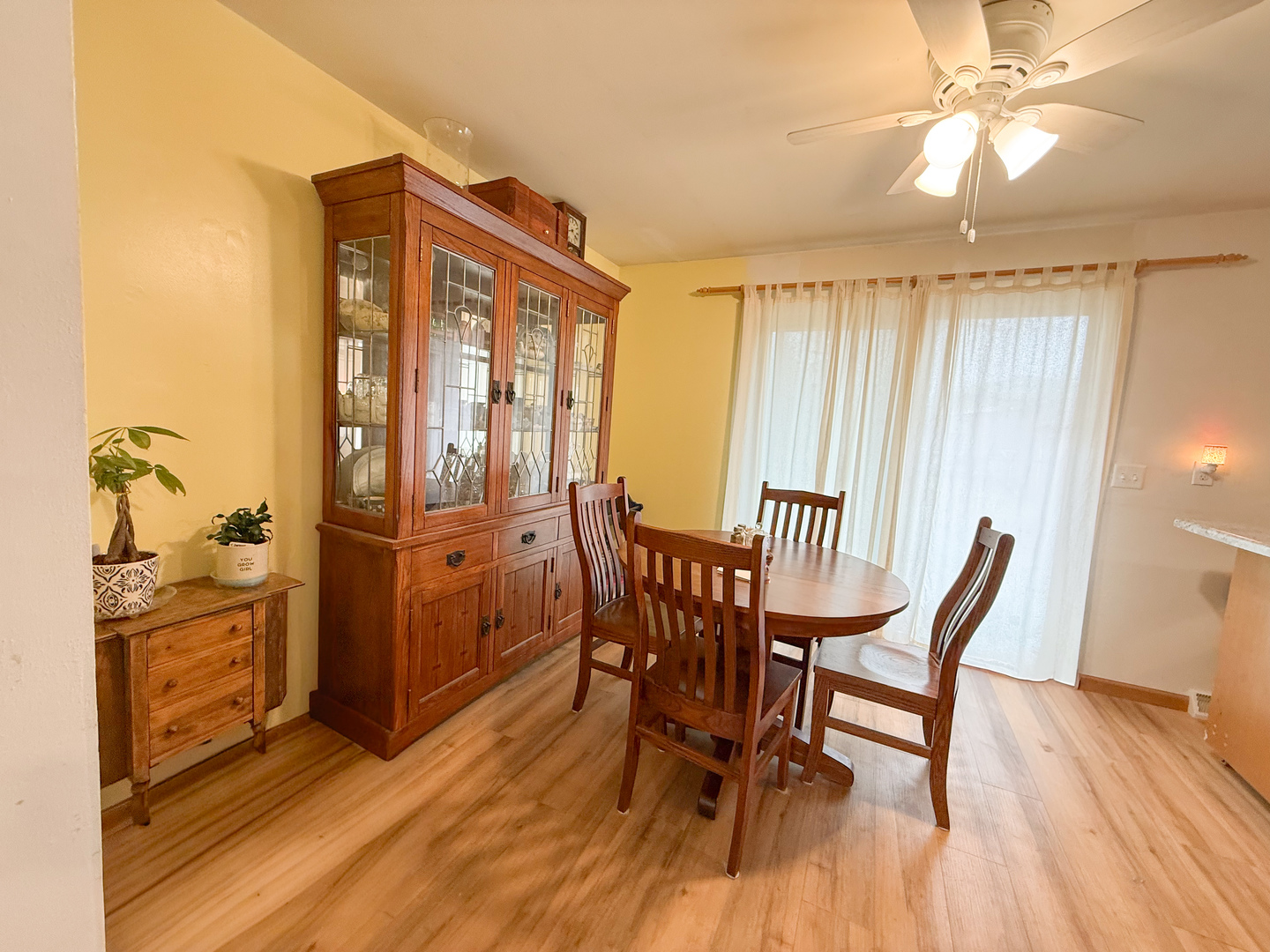 802 East 19th Street Sterling, IL 61081 - Photo 14 of 29 a view of a dining room with furniture and chandelier