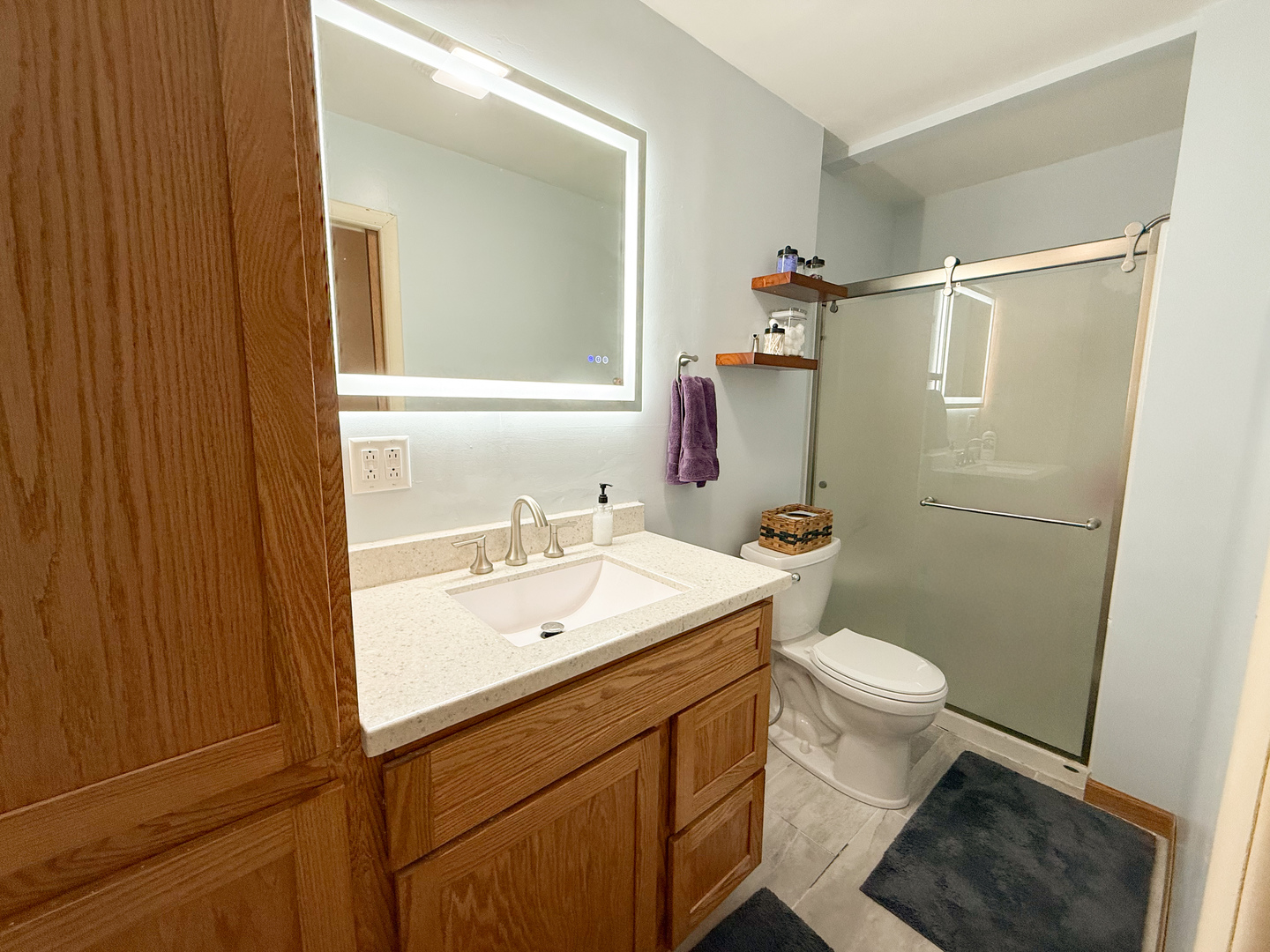 802 East 19th Street Sterling, IL 61081 - Photo 17 of 29 a bathroom with a sink toilet and shower