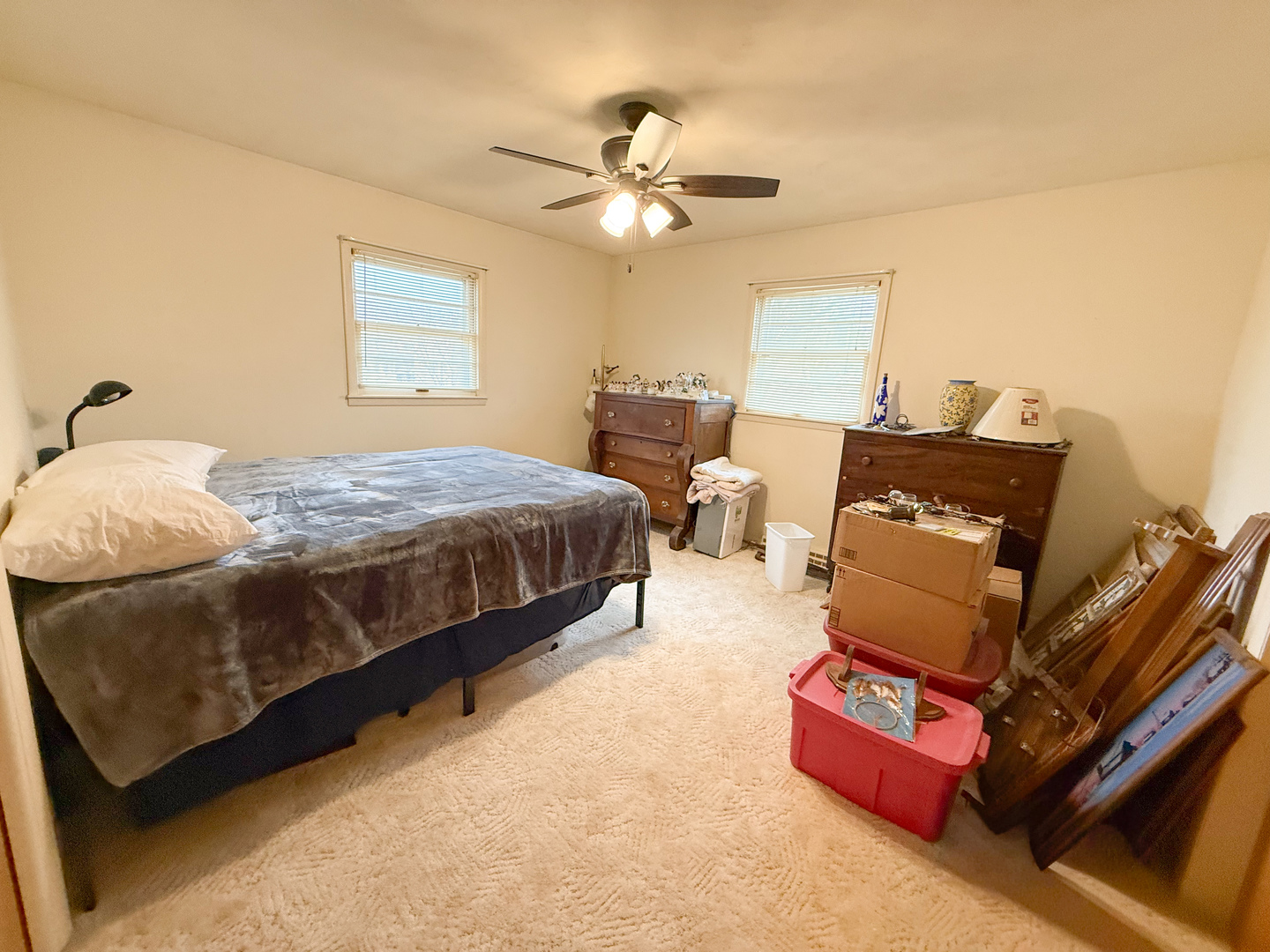 802 East 19th Street Sterling, IL 61081 - Photo 22 of 29 a bedroom with bed and window