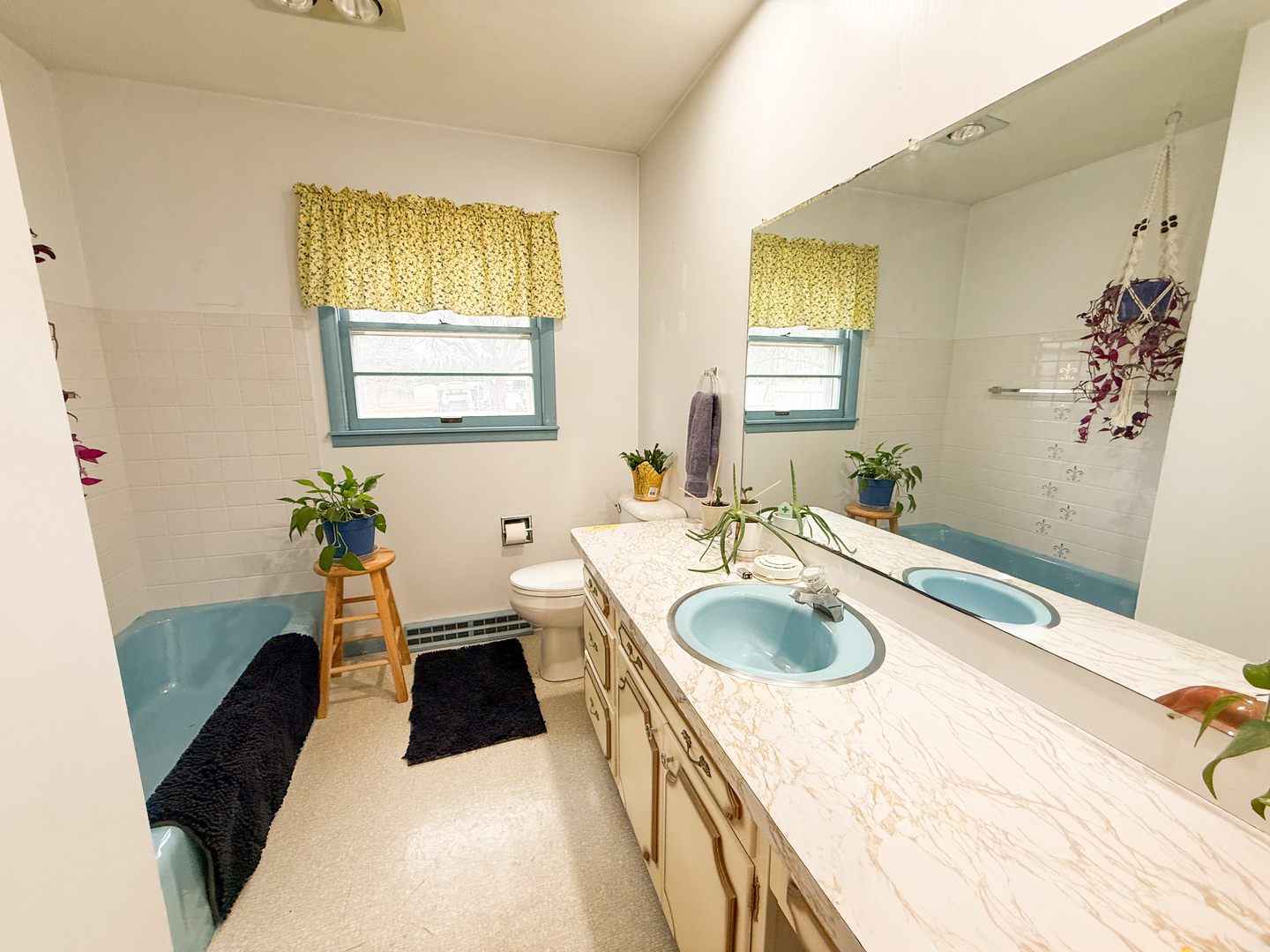 802 East 19th Street Sterling, IL 61081 - Photo 23 of 29 a spacious bathroom with a granite countertop tub sink and mirror