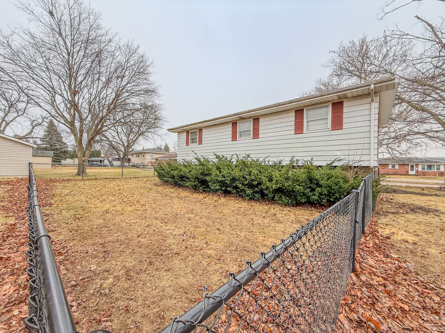 802 East 19th Street Sterling, IL 61081 - Photo 29 of 29 a front view of a house with a yard
