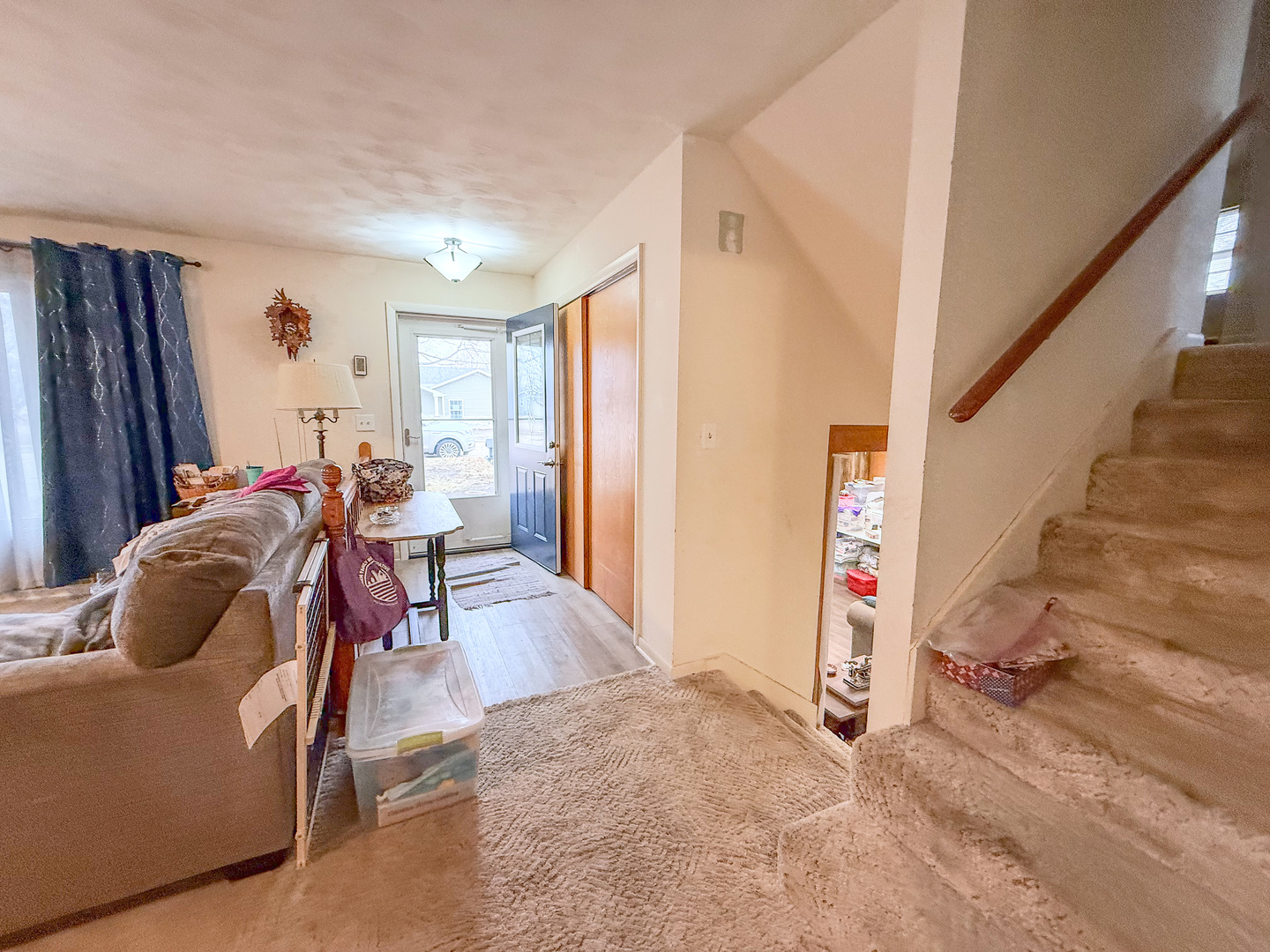 802 East 19th Street Sterling, IL 61081 - Photo 7 of 29 a bed room with a bed and a window