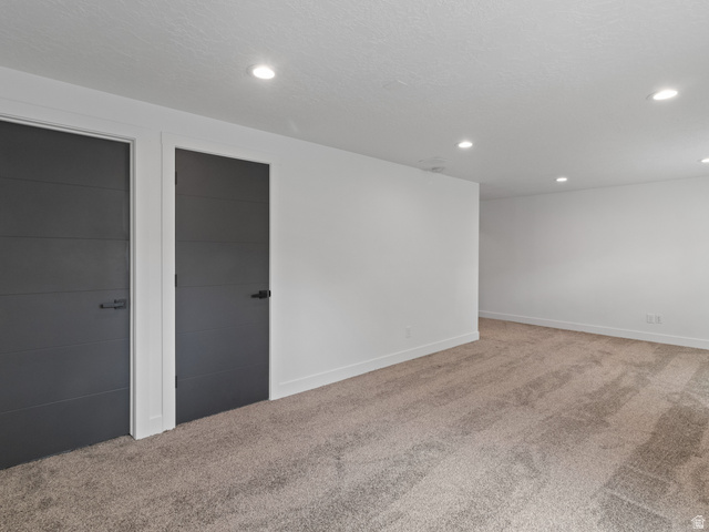 130 East 7085th South, Unit 3 Midvale, UT 84047 - Photo 21 of 30 Below grade area featuring carpet and recessed lighting
