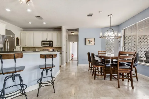 a view of a dining room with furniture