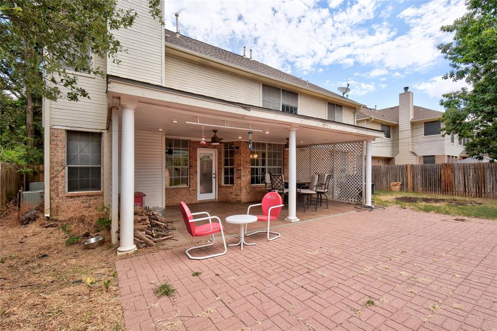 1909 Springwater Drive Round Rock, TX 78681 - Photo 32 of 34 Rear view of house featuring ceiling fan, a patio area, and brick siding