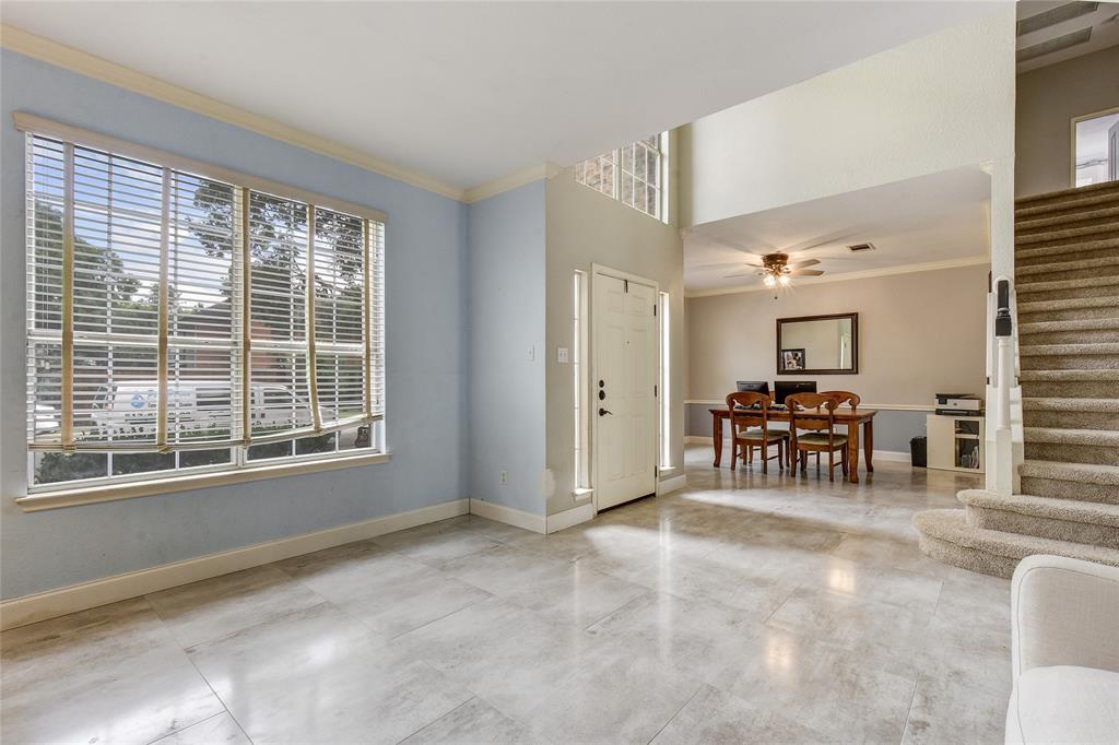 1909 Springwater Drive Round Rock, TX 78681 - Photo 4 of 34 Foyer entrance featuring stairs and ornamental molding