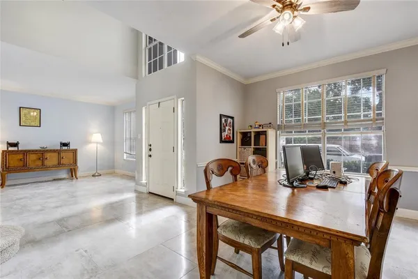 a view of a workspace with furniture