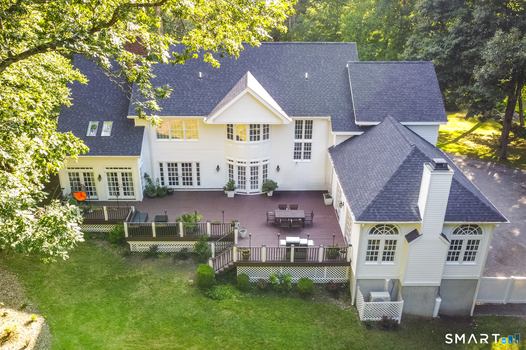 333 Rock Rimmon Road Stamford, CT 06903 - Photo 4 of 40 Huge deck for entertaining; spacious, level yard for play.