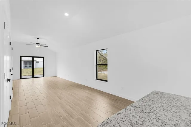 an empty room with windows