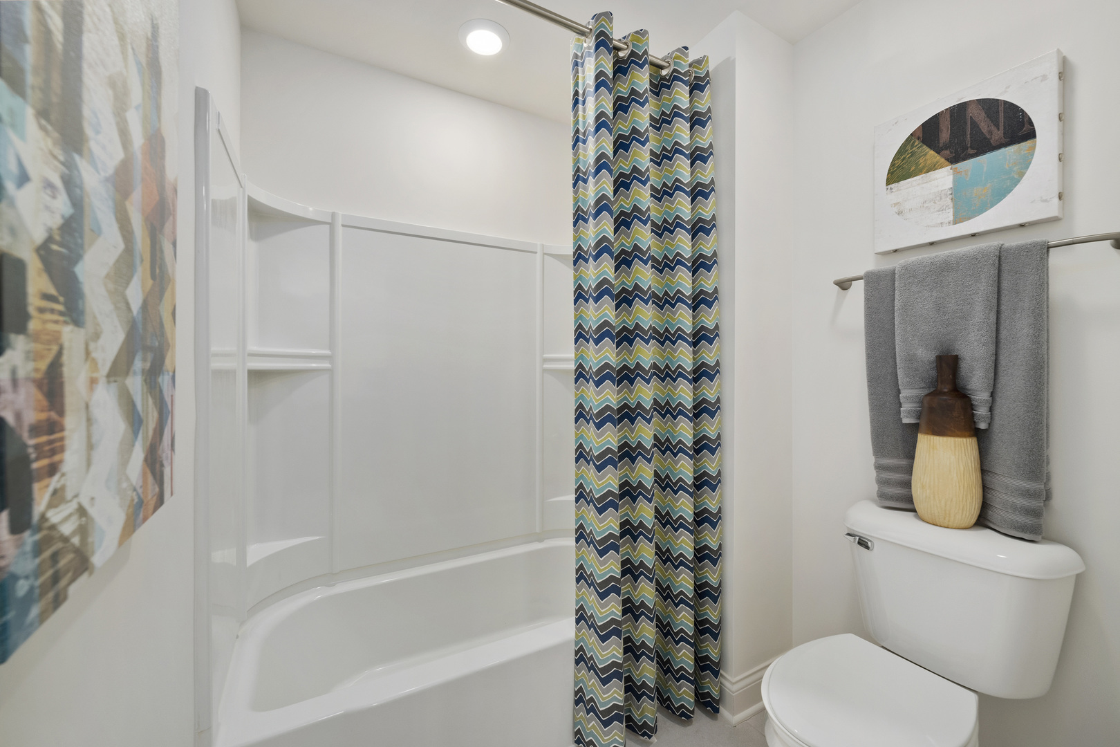 3650 Edelweiss Road Elgin, IL 60124 - Photo 25 of 38 a bathroom with a toilet and shower curtain