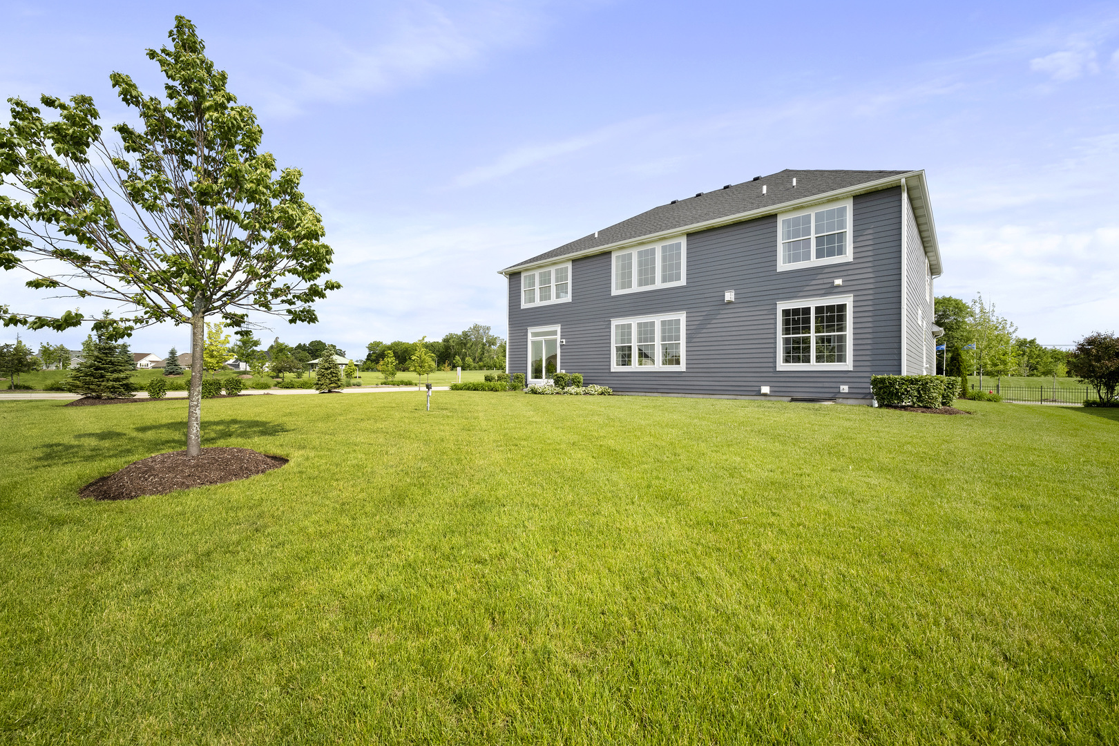3650 Edelweiss Road Elgin, IL 60124 - Photo 3 of 38 a front view of house with yard and trees