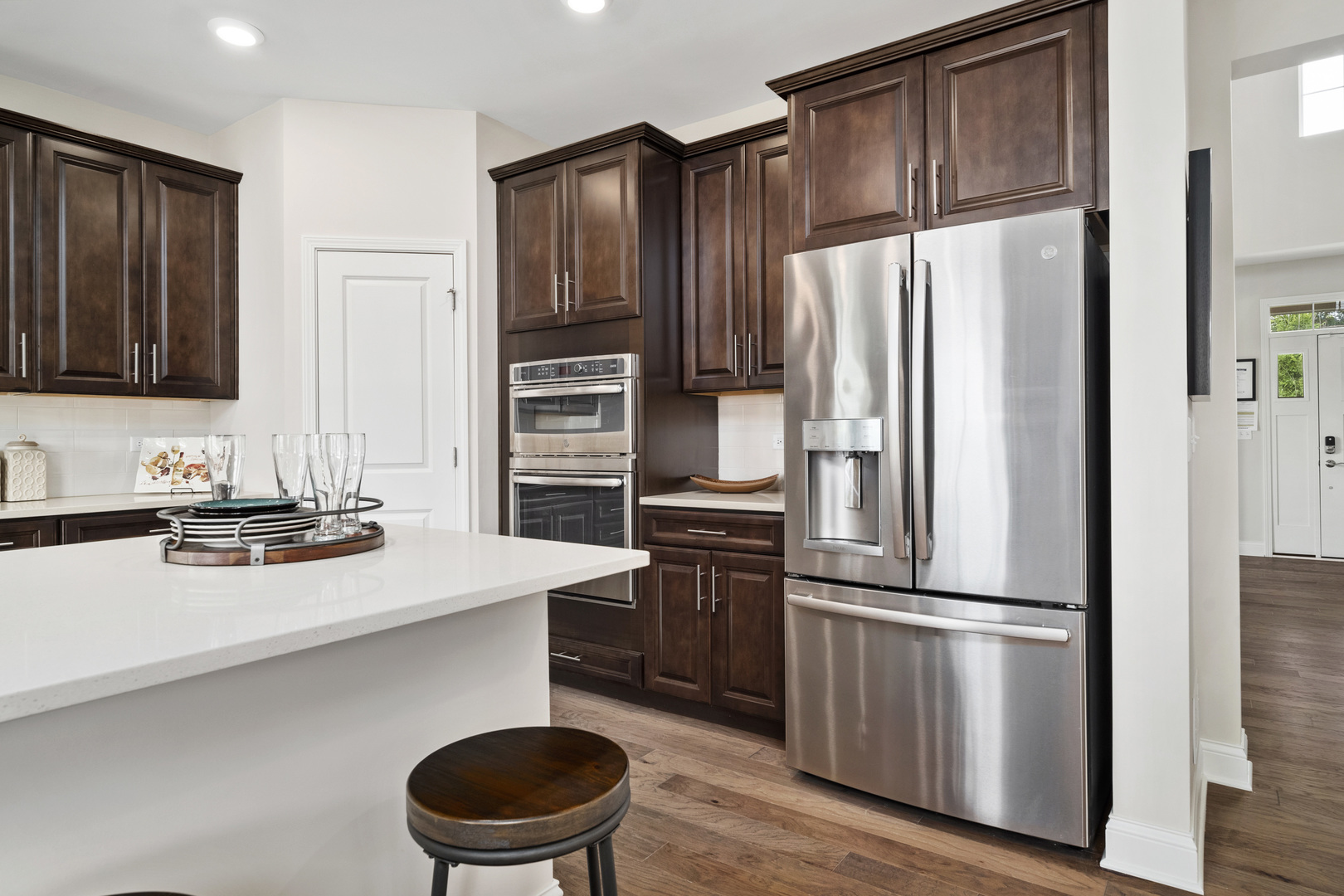 3650 Edelweiss Road Elgin, IL 60124 - Photo 9 of 38 a kitchen with stainless steel appliances a refrigerator stove and sink