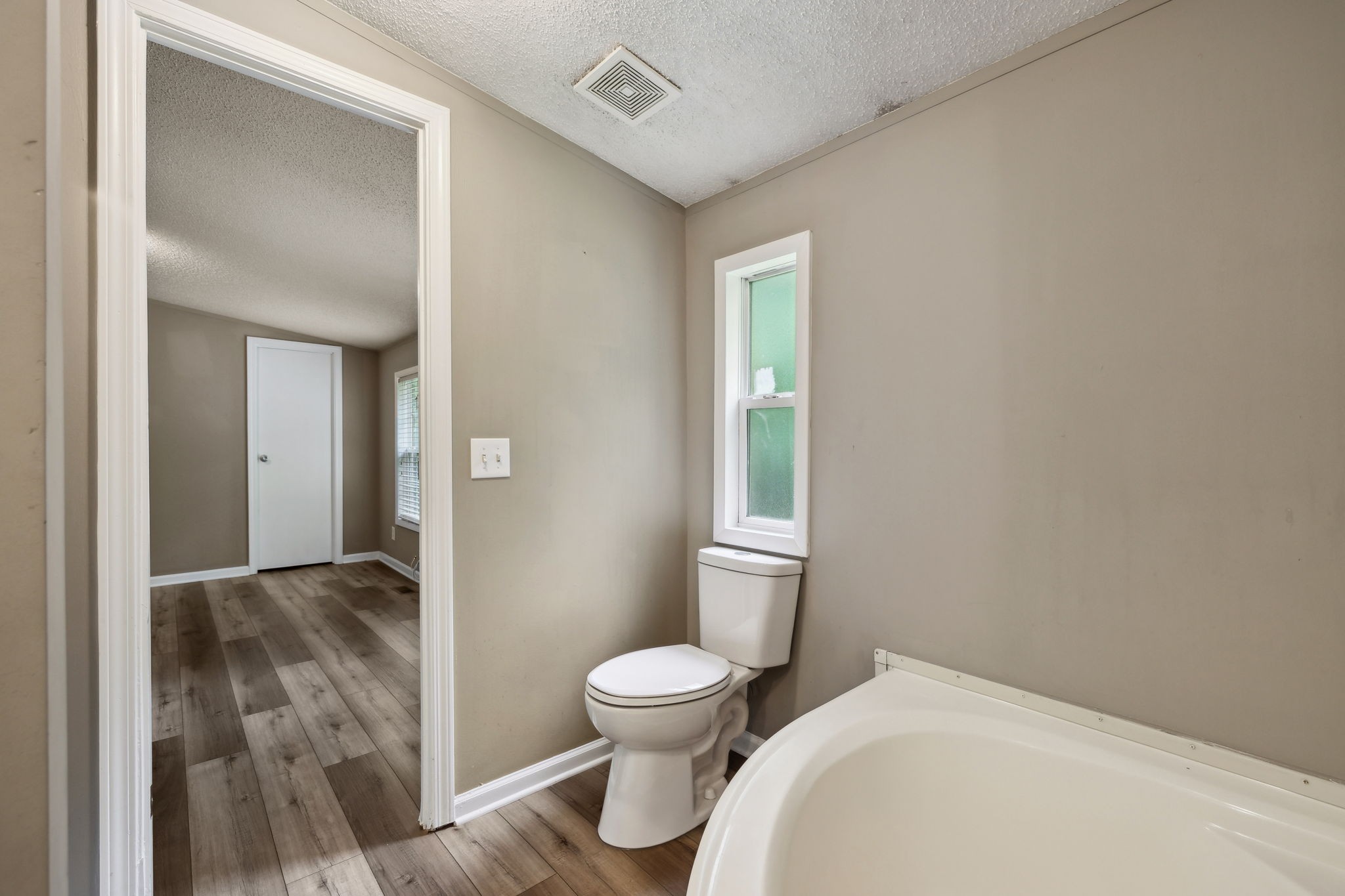 2201 Mt Pleasant Cemetery Road Primm Springs, TN 38476 - Photo 20 of 36 a bathroom with a toilet and a mirror