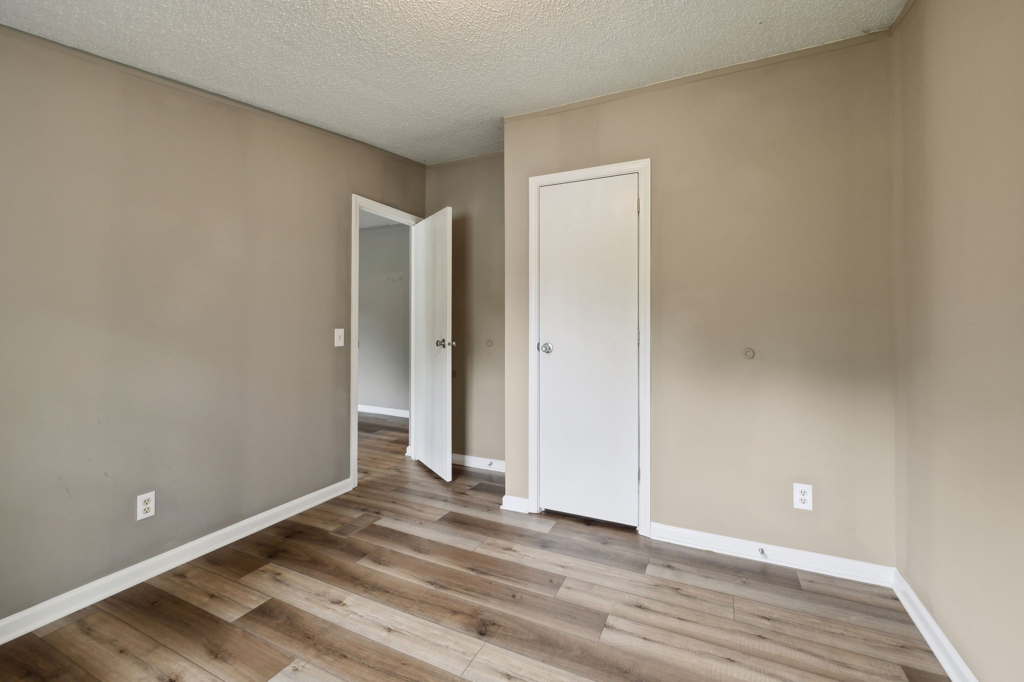 2201 Mt Pleasant Cemetery Road Primm Springs, TN 38476 - Photo 25 of 36 a view of an empty room and wooden floor