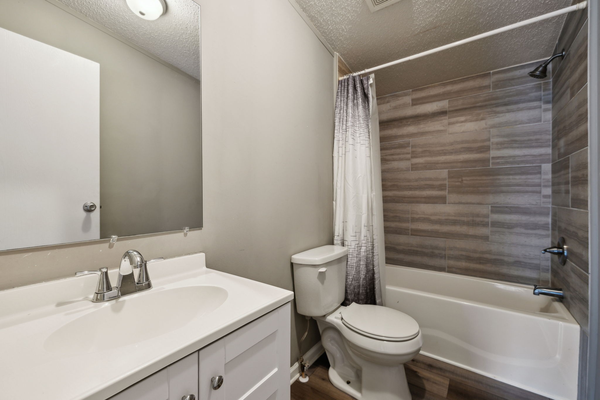 2201 Mt Pleasant Cemetery Road Primm Springs, TN 38476 - Photo 26 of 36 a bathroom with a sink toilet and shower