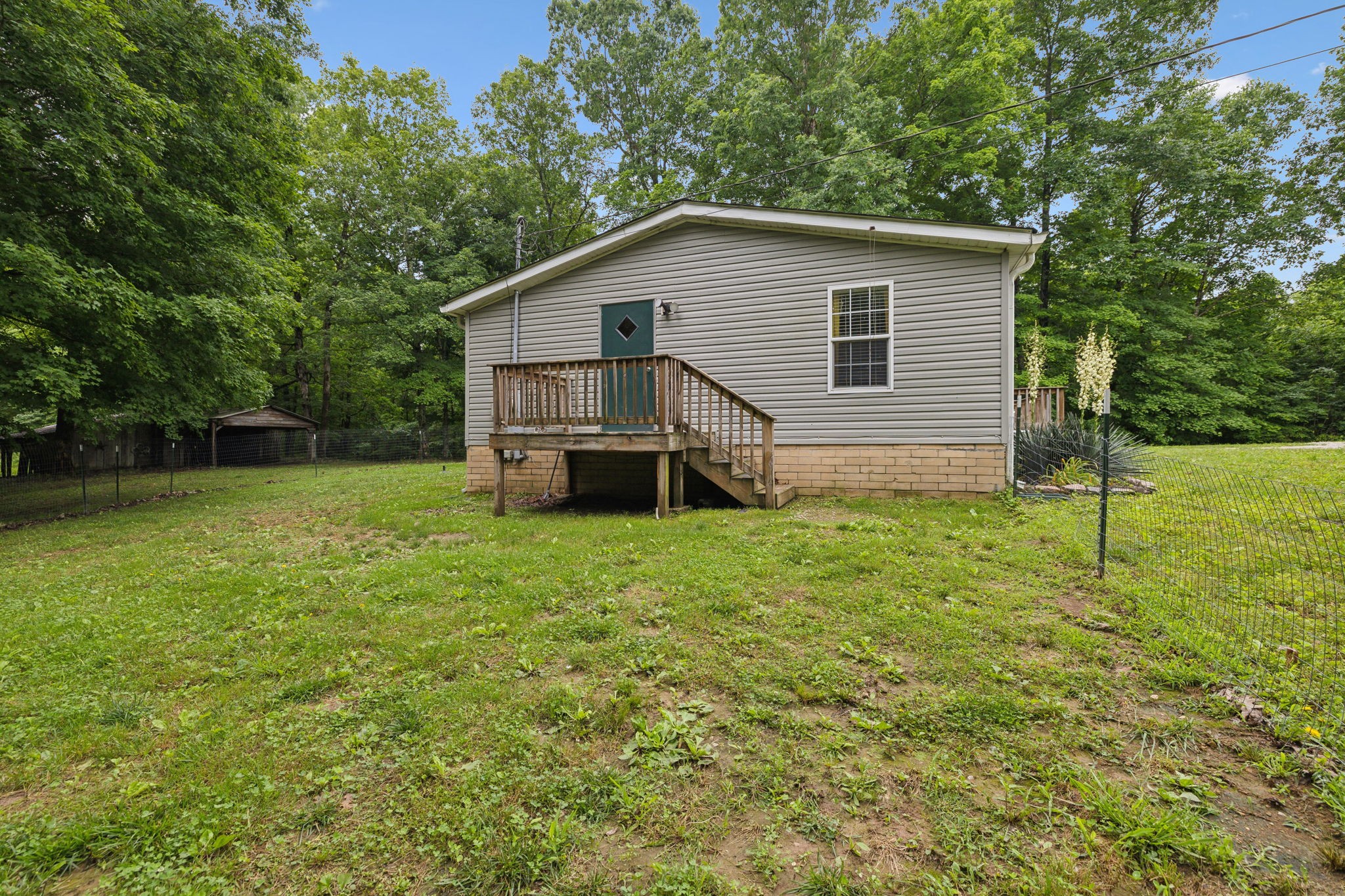 2201 Mt Pleasant Cemetery Road Primm Springs, TN 38476 - Photo 34 of 36 a view of a house with backyard