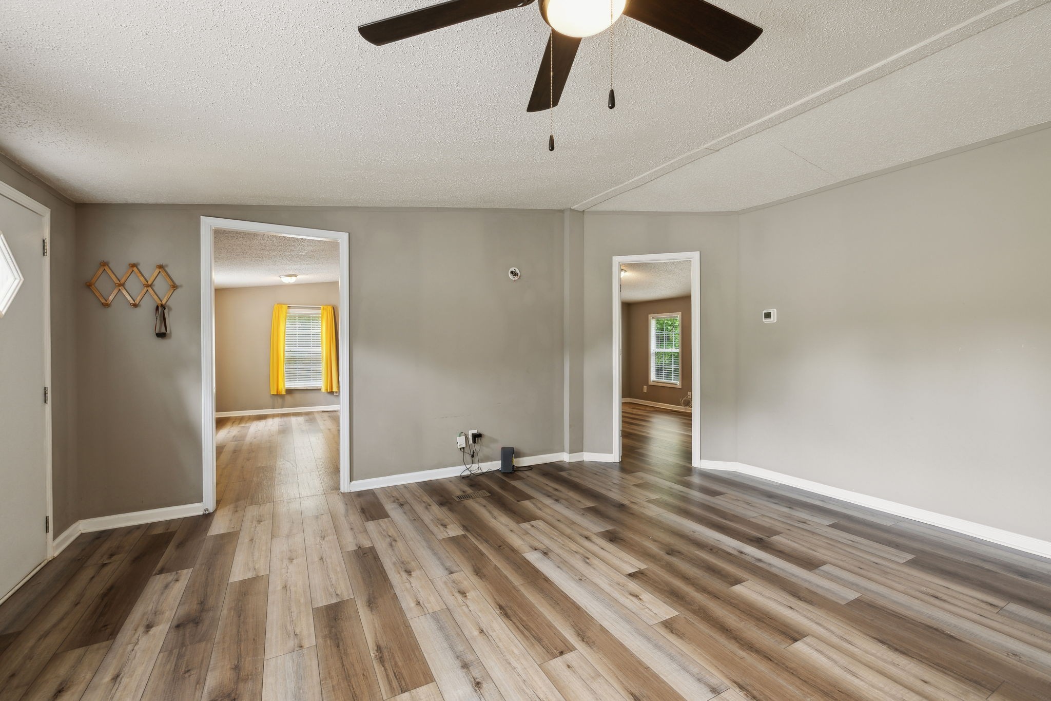 2201 Mt Pleasant Cemetery Road Primm Springs, TN 38476 - Photo 8 of 36 a view of empty room with wooden floor