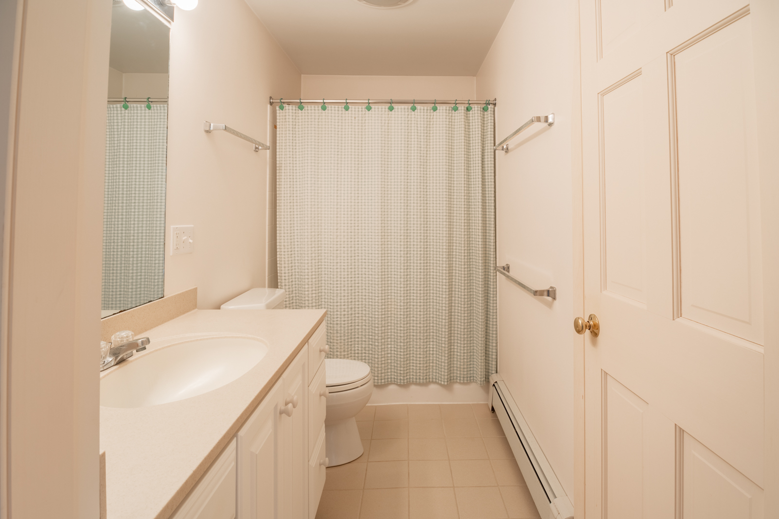 15 Swift Rock Road Nantucket, MA 02554 - Photo 17 of 32 a bathroom with a sink a toilet and shower