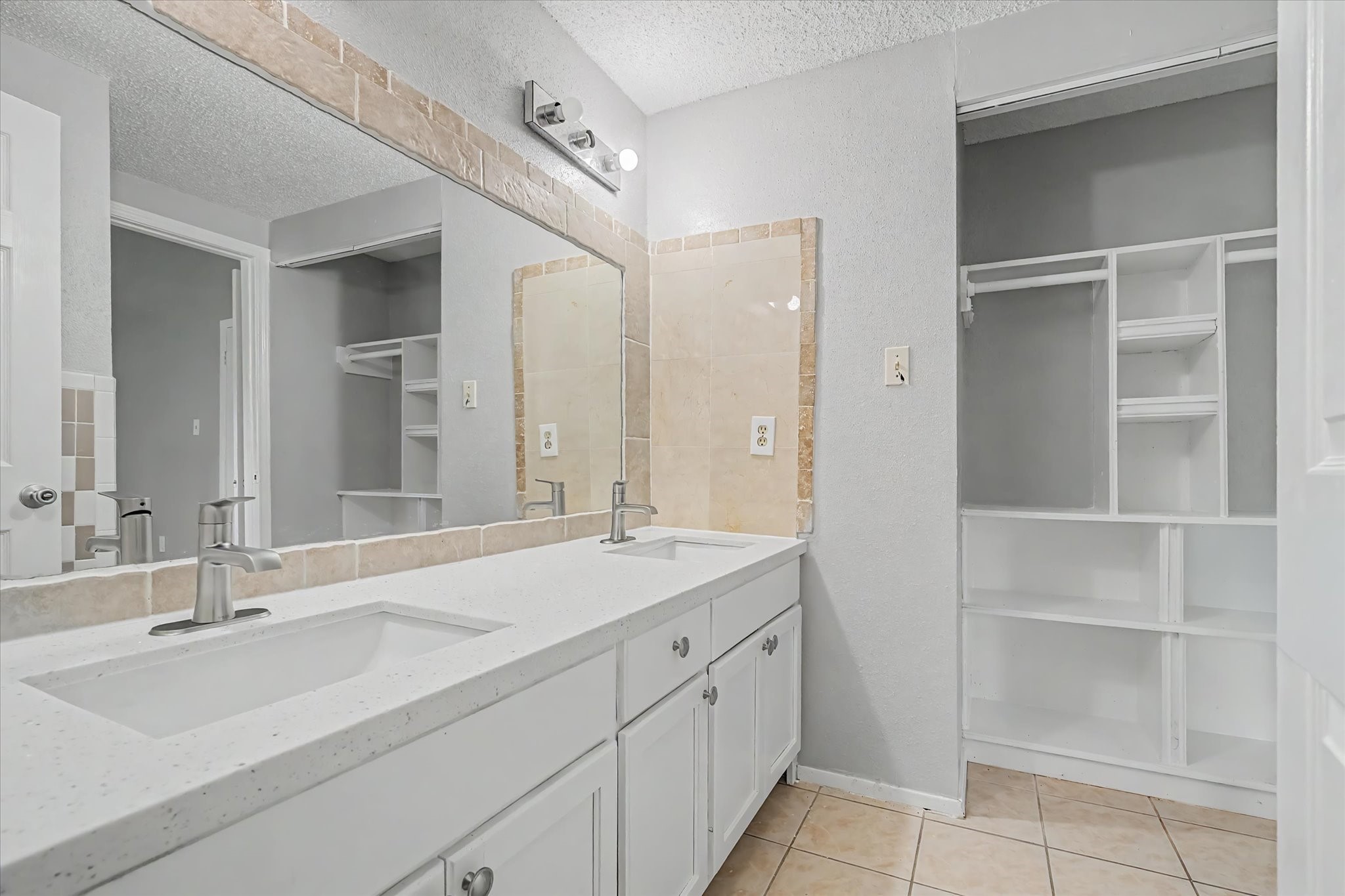 7330 South Dairy Ashford Road Houston, TX 77072 - Photo 23 of 33 a bathroom with a sink and a mirror