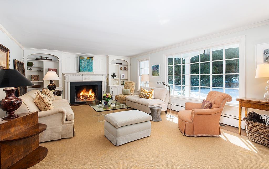 155 Michigan Road New Canaan, CT 06840 - Photo 4 of 40 a living room with furniture and a fireplace