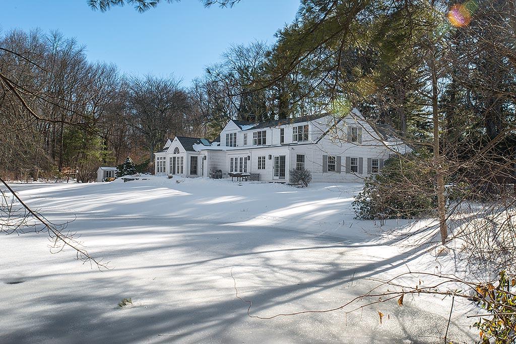 155 Michigan Road New Canaan, CT 06840 - Photo 40 of 40 a view of a house with a yard