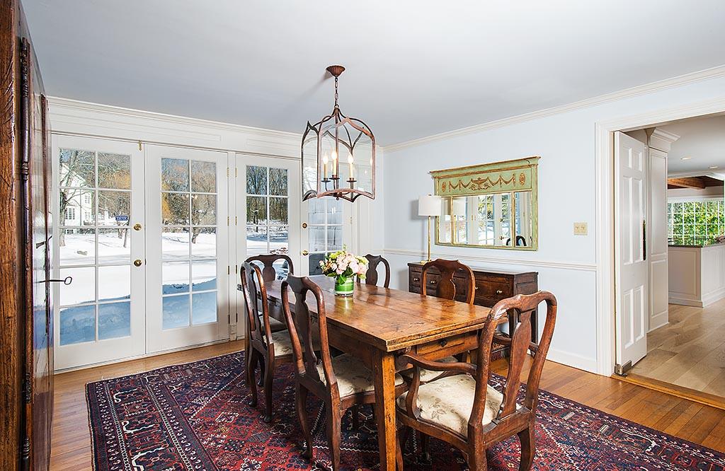 155 Michigan Road New Canaan, CT 06840 - Photo 5 of 40 a view of a dining room with furniture window and wooden floor