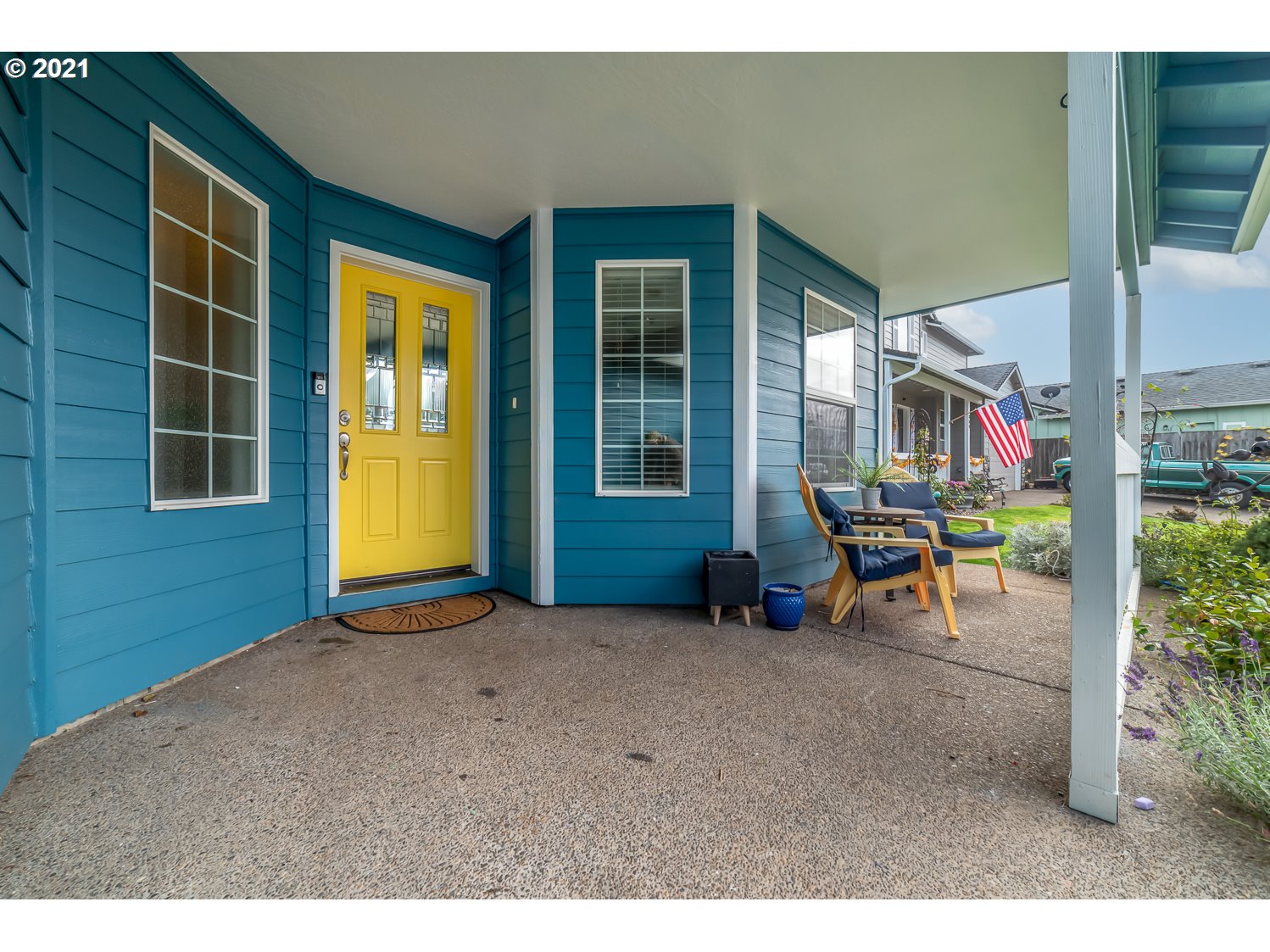 870 Kristen Way Cottage Grove, OR 97424 - Photo 6 of 31 a backyard of a house with barbeque oven table and chairs