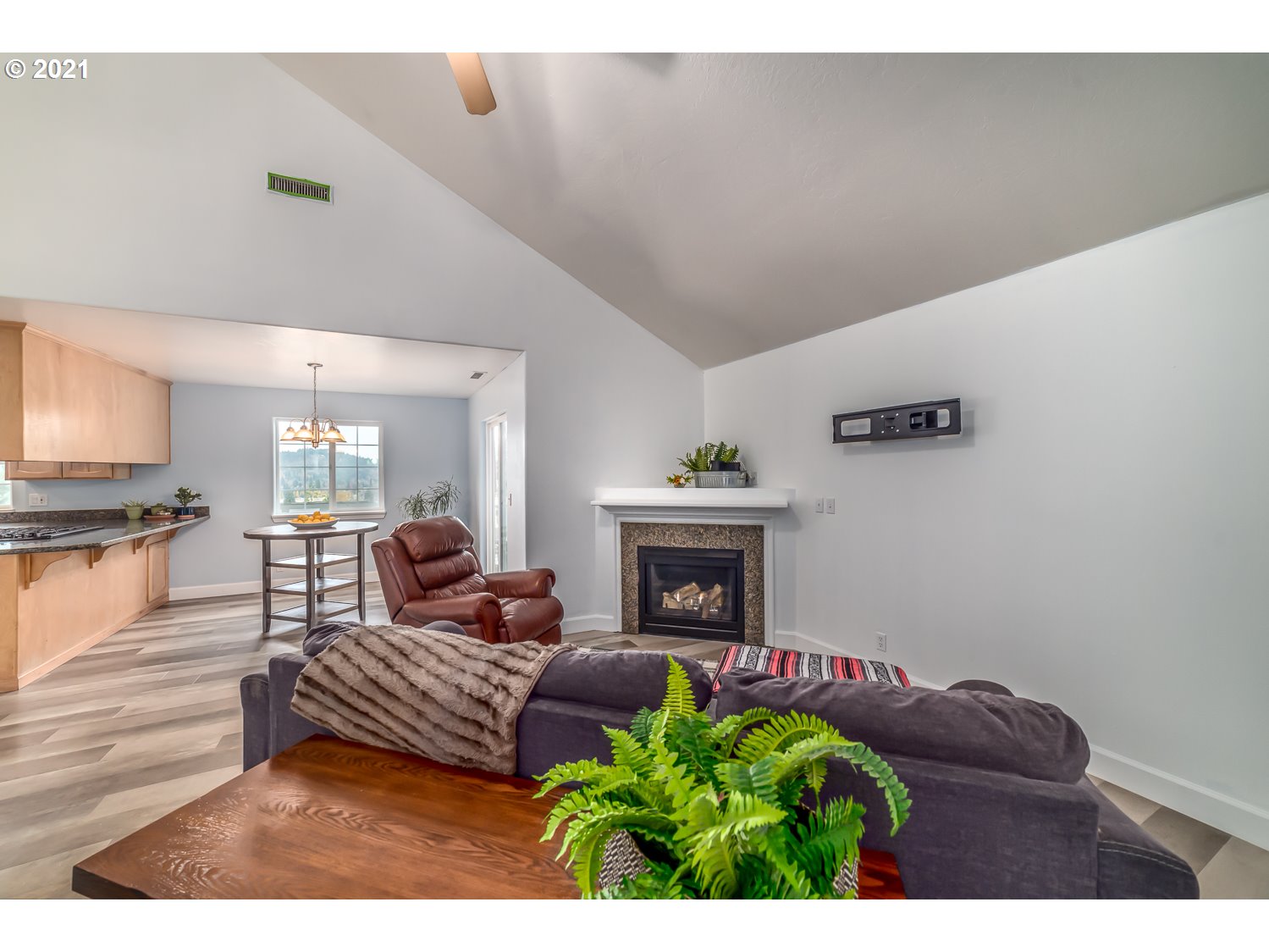870 Kristen Way Cottage Grove, OR 97424 - Photo 8 of 31 a living room with furniture and a fireplace