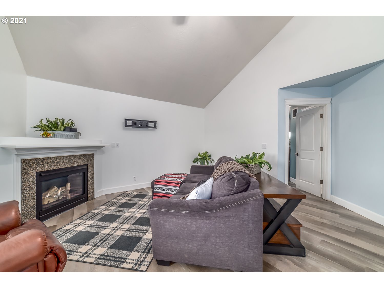 870 Kristen Way Cottage Grove, OR 97424 - Photo 9 of 31 a living room with furniture and a fireplace