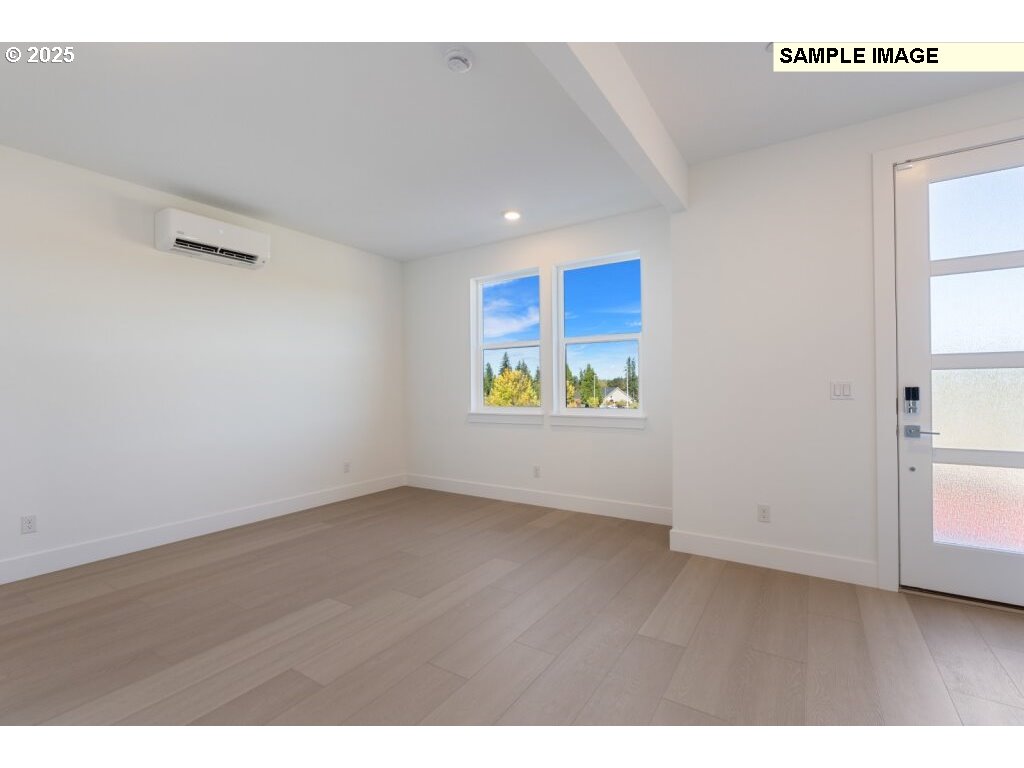 6420 Northwest Olympic Lane, Unit L47 Camas, WA 98607 - Photo 20 of 24 a view of an empty room with a window