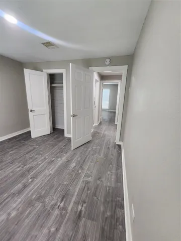 a view of a livingroom with wooden floor