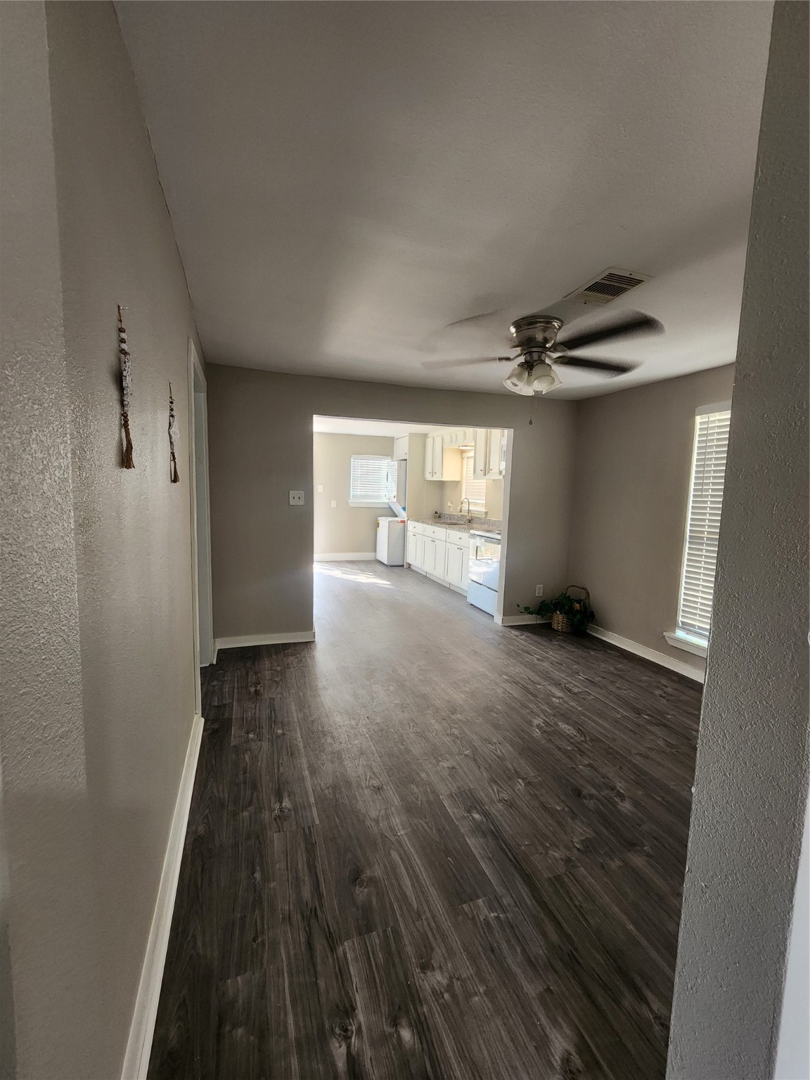 6203 Hoffman Street Houston, TX 77028 - Photo 19 of 19 wooden floor in an empty room with a window