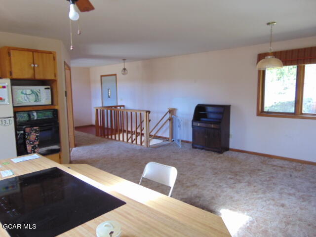 446 County Road 86 Tabernash, CO 80478 - Photo 16 of 36 a living room with furniture rug and window