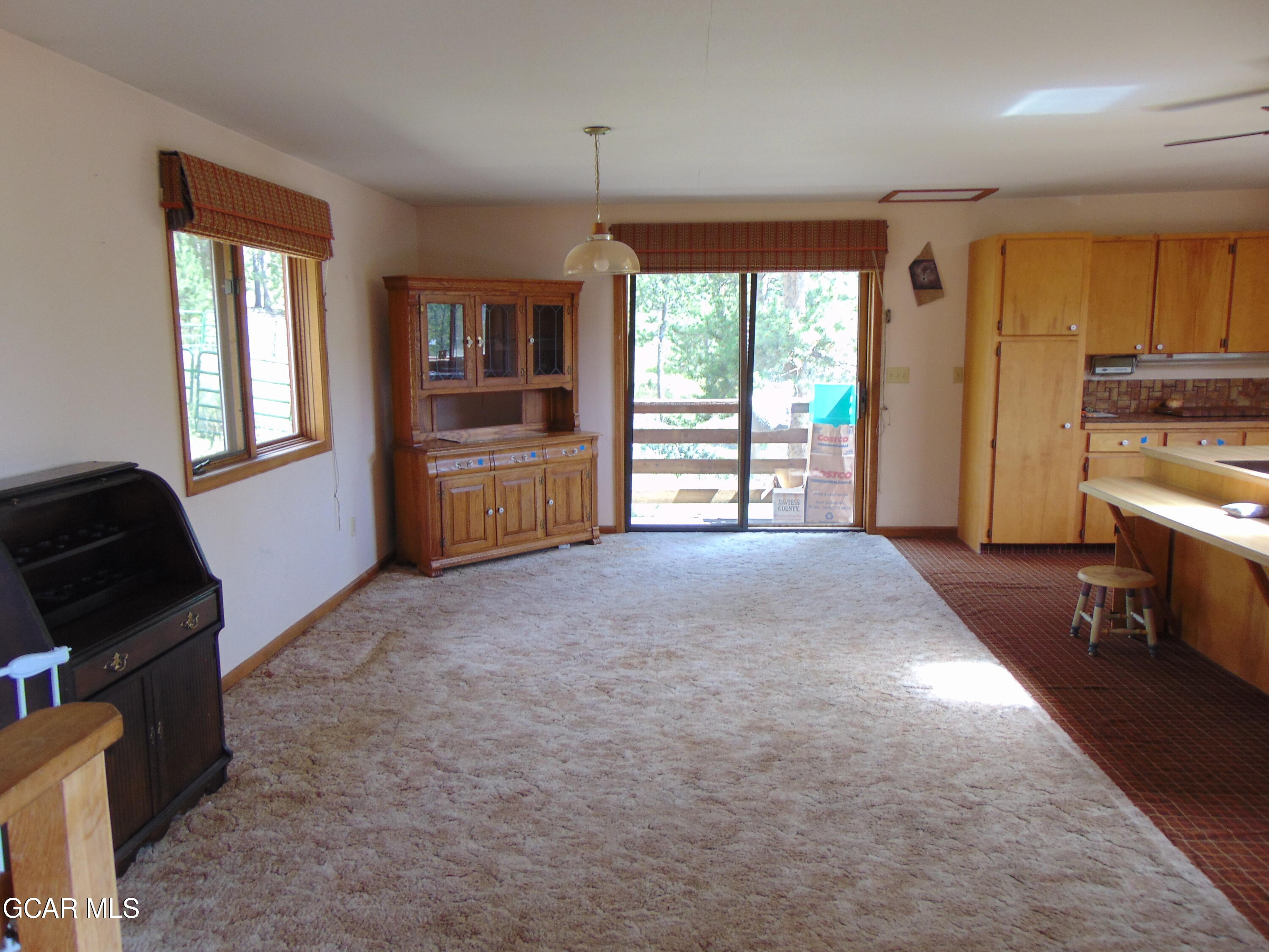 446 County Road 86 Tabernash, CO 80478 - Photo 18 of 36 a furnished livingroom with windows and cabinet