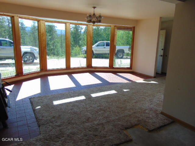 446 County Road 86 Tabernash, CO 80478 - Photo 26 of 36 a view of an empty room with windows