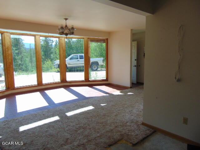 446 County Road 86 Tabernash, CO 80478 - Photo 27 of 36 a view of an empty room with a window