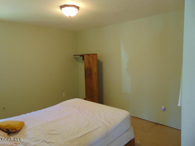 446 County Road 86 Tabernash, CO 80478 - Photo 29 of 36 a bedroom with a bed
