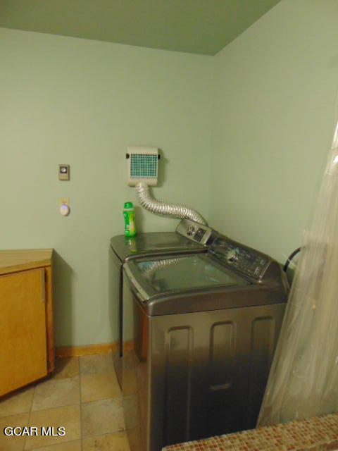 446 County Road 86 Tabernash, CO 80478 - Photo 35 of 36 a utility room with dryer and washer