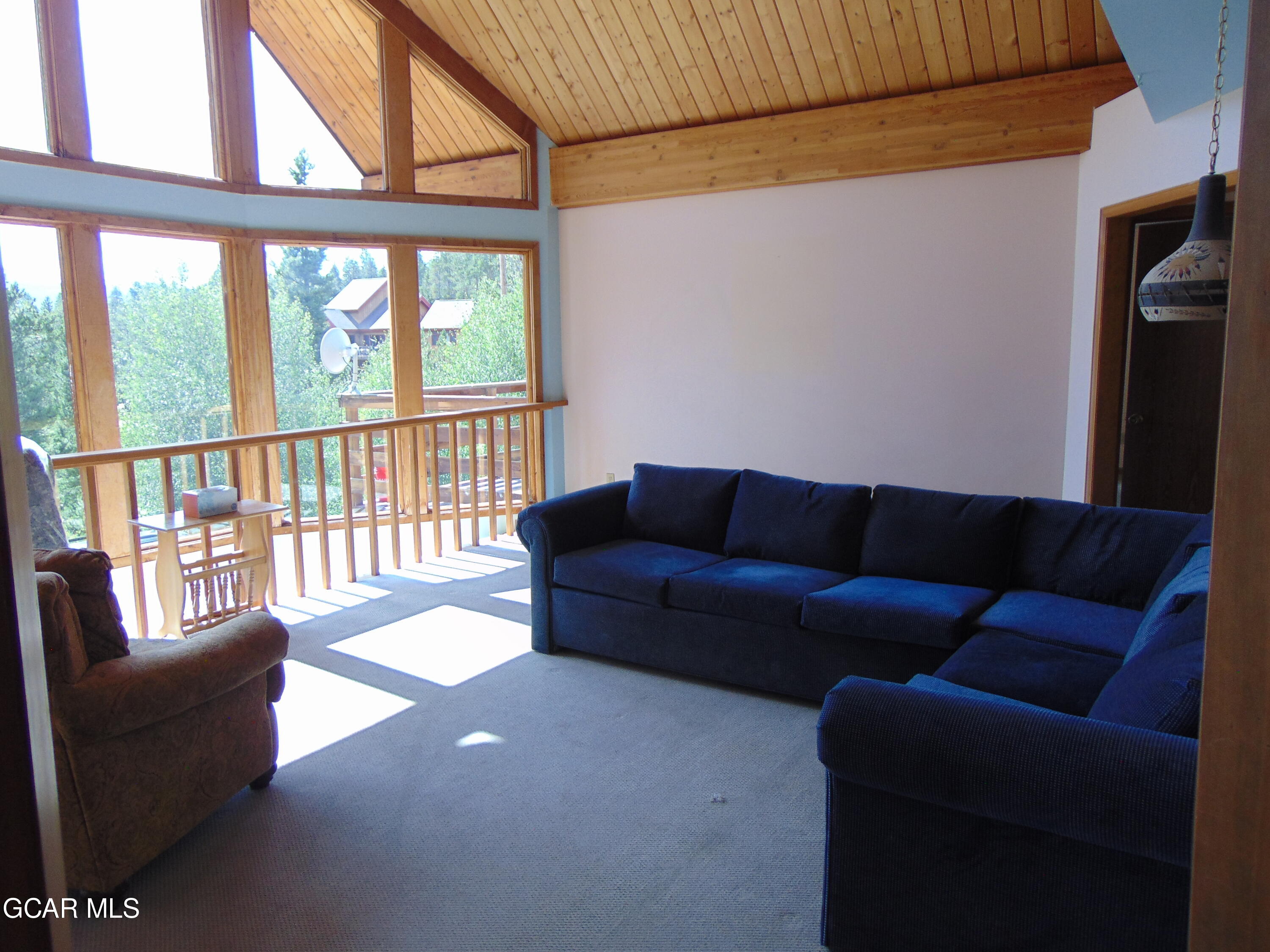 446 County Road 86 Tabernash, CO 80478 - Photo 8 of 36 a living room with furniture and a window