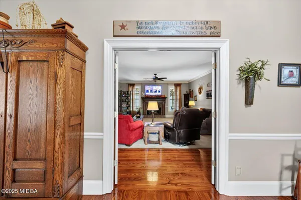 a kitchen with stainless steel appliances a stove sink microwave and cabinets