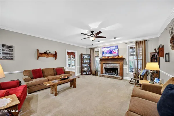 a kitchen with stainless steel appliances granite countertop a sink stove and wooden cabinets