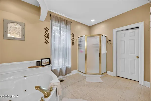 a bathroom with a sink vanity and a mirror