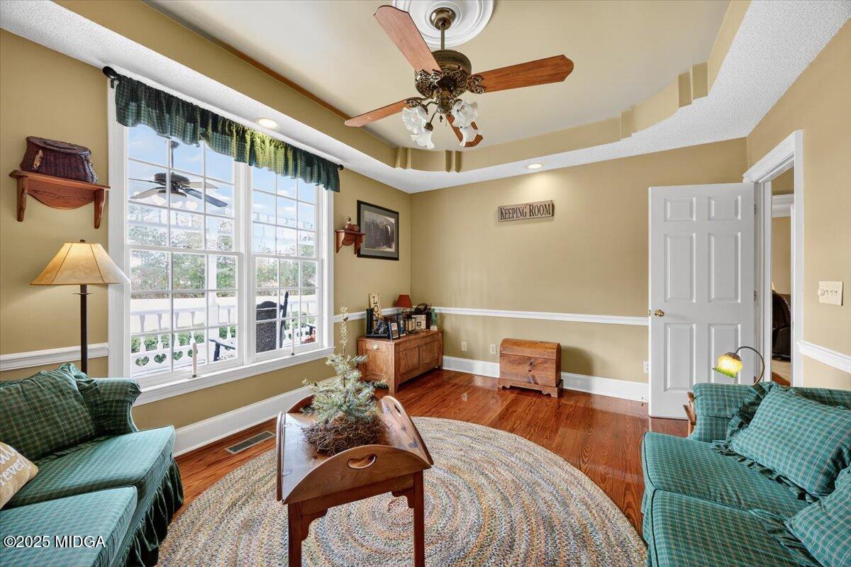 5771 Rogers Road Lizella, GA 31052 - Photo 25 of 74 a living room with furniture and a large window
