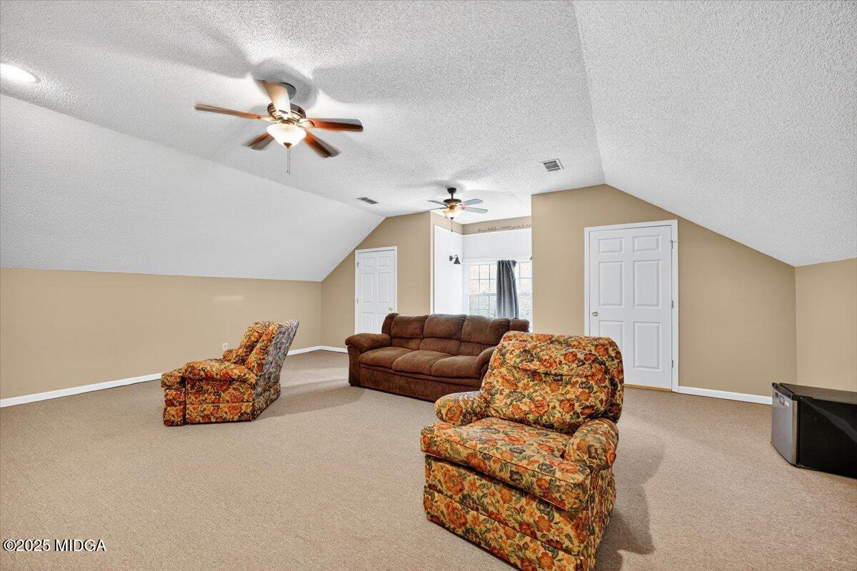 5771 Rogers Road Lizella, GA 31052 - Photo 40 of 74 a living room with furniture
