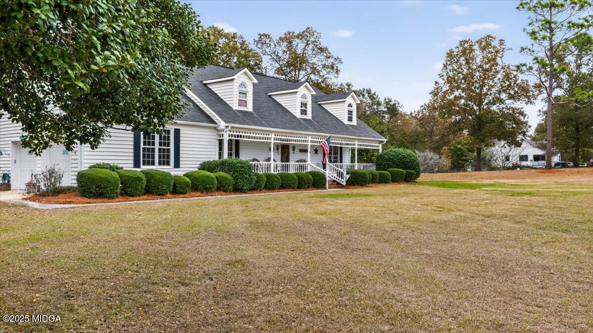 5771 Rogers Road Lizella, GA 31052 - Photo 62 of 74 a front view of house with yard and green space
