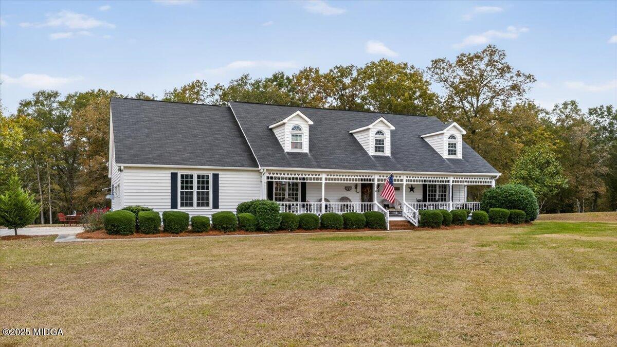5771 Rogers Road Lizella, GA 31052 - Photo 63 of 74 a front view of a house with a yard